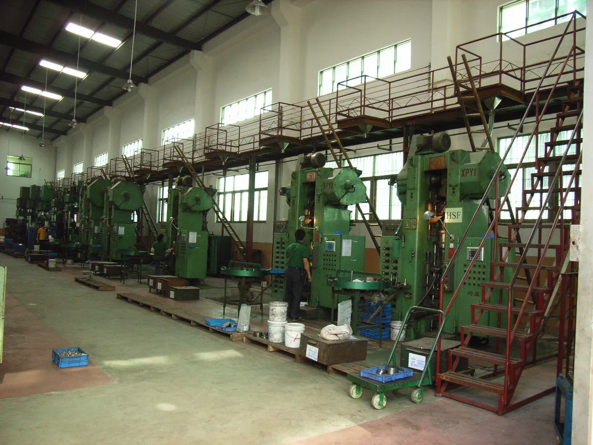MIM injection molding machine producing repeat parts