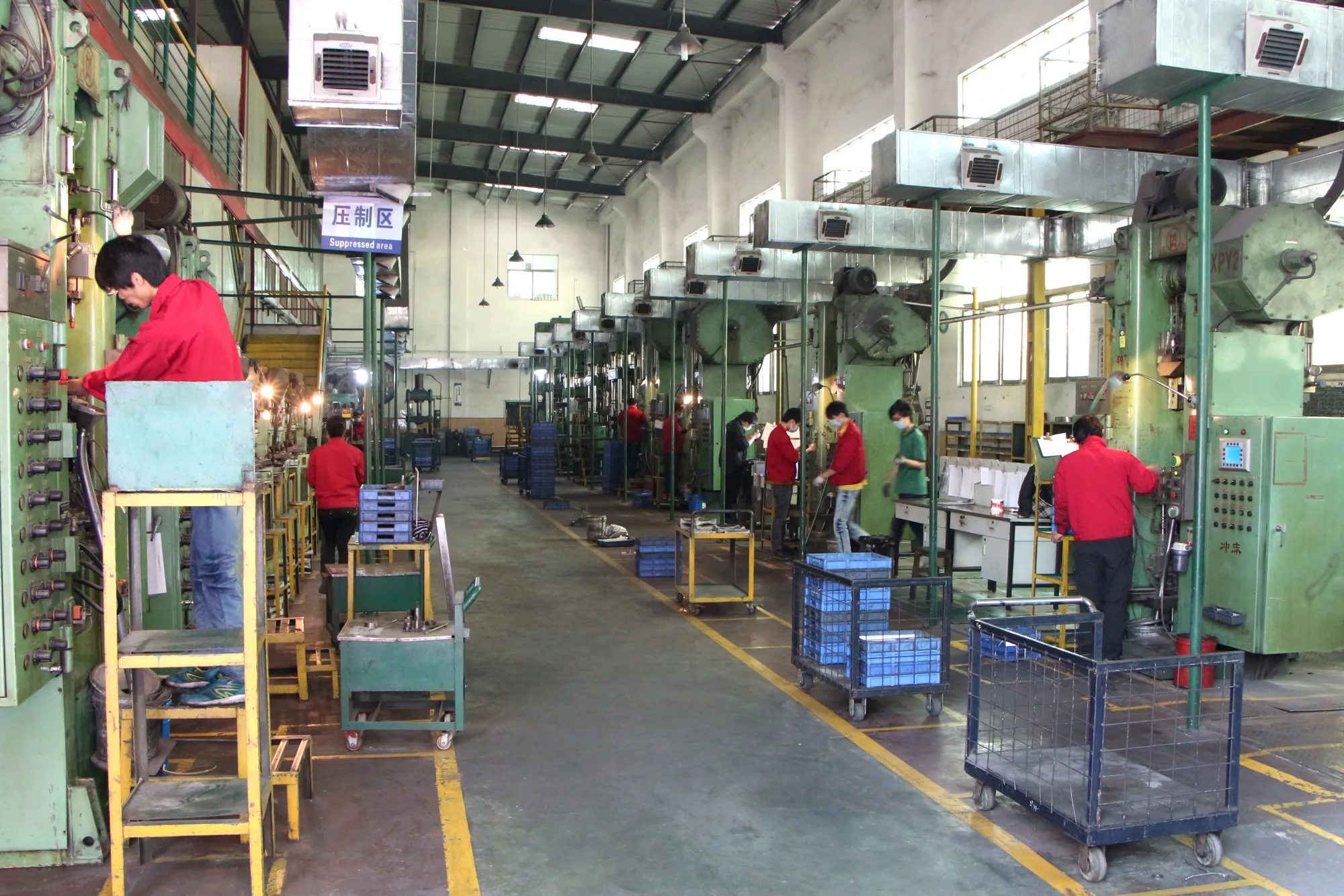 MIM pressing workshop — production floor
