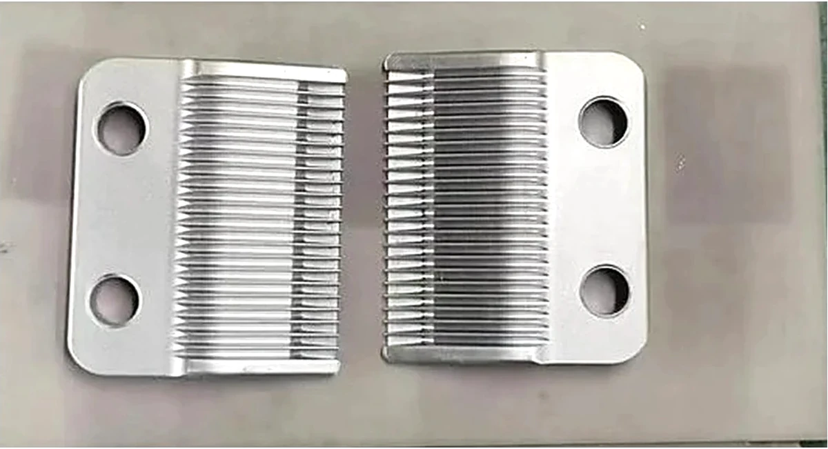 Serrated stainless cutting blades of the type produced by SINTS; representative geometry, not the part described in this note